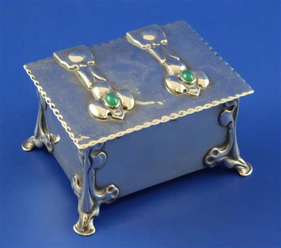 An Edwardian Art Nouveau silver and green cabochon set rectangular casket by William Hutton & Sons, gross 10.5 oz.